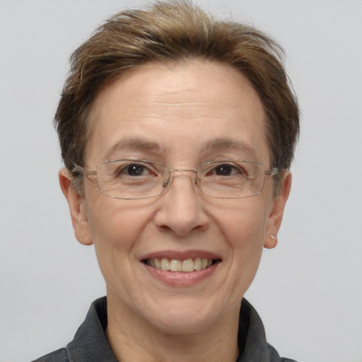 Joyful white middle-aged female with short  brown hair and brown eyes