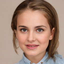 Joyful white young-adult female with medium  brown hair and blue eyes