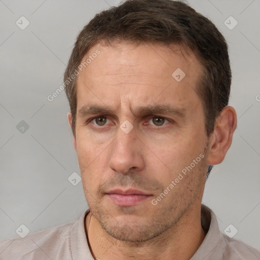 Neutral white adult male with short  brown hair and brown eyes