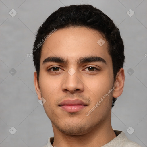 Neutral latino young-adult male with short  black hair and brown eyes