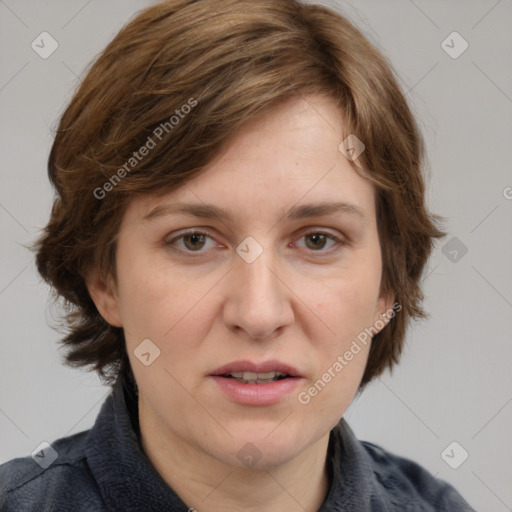 Joyful white adult female with medium  brown hair and grey eyes