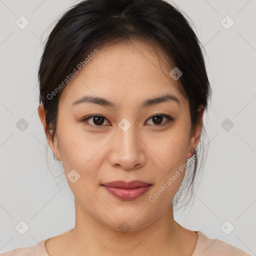 Joyful asian young-adult female with medium  brown hair and brown eyes