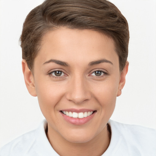 Joyful white young-adult female with short  brown hair and brown eyes