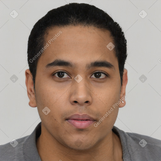 Neutral latino young-adult male with short  black hair and brown eyes