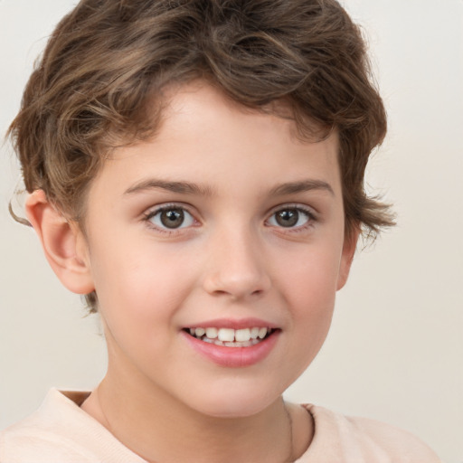 Joyful white child male with short  brown hair and brown eyes