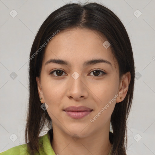 Joyful latino young-adult female with long  brown hair and brown eyes