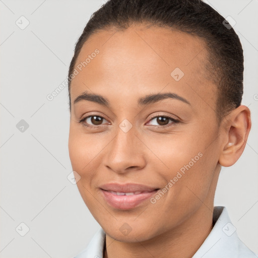 Joyful white young-adult female with short  brown hair and brown eyes