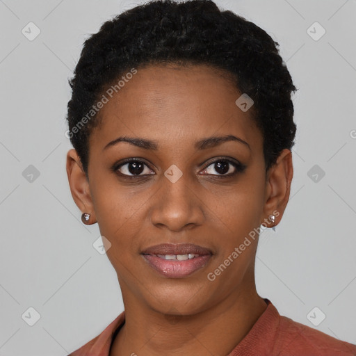 Joyful black young-adult female with short  black hair and brown eyes