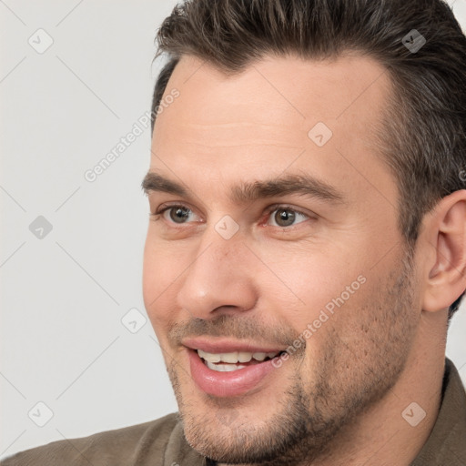 Joyful white young-adult male with short  brown hair and brown eyes