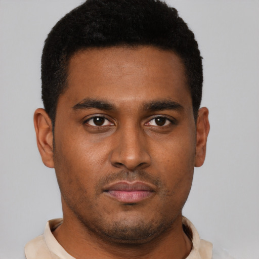 Neutral black young-adult male with short  brown hair and brown eyes
