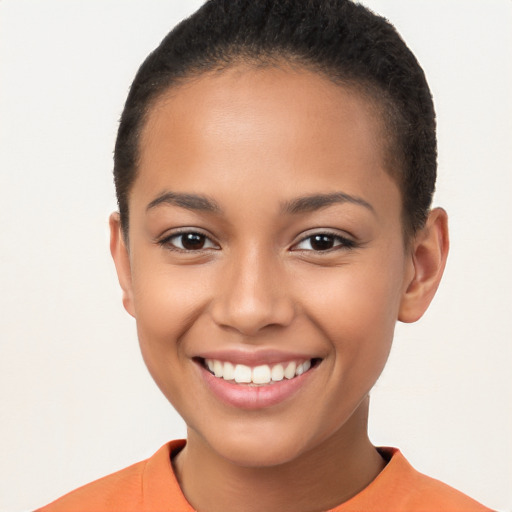 Joyful latino young-adult female with short  brown hair and brown eyes