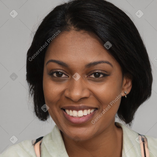 Joyful black young-adult female with medium  black hair and brown eyes