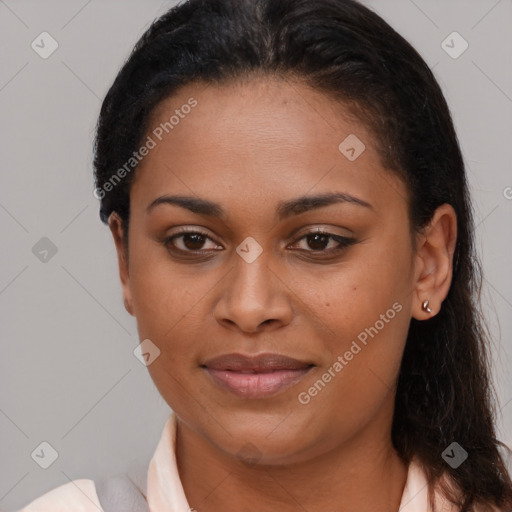 Joyful latino young-adult female with medium  brown hair and brown eyes