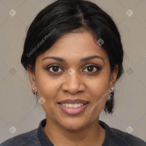 Joyful black young-adult female with medium  black hair and brown eyes