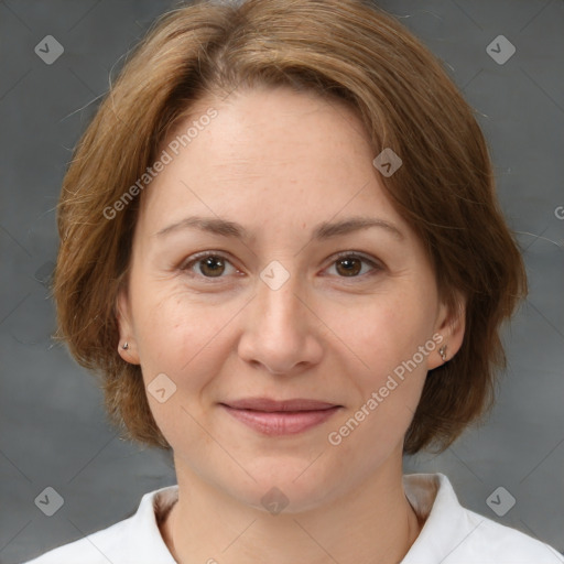 Joyful white adult female with medium  brown hair and brown eyes