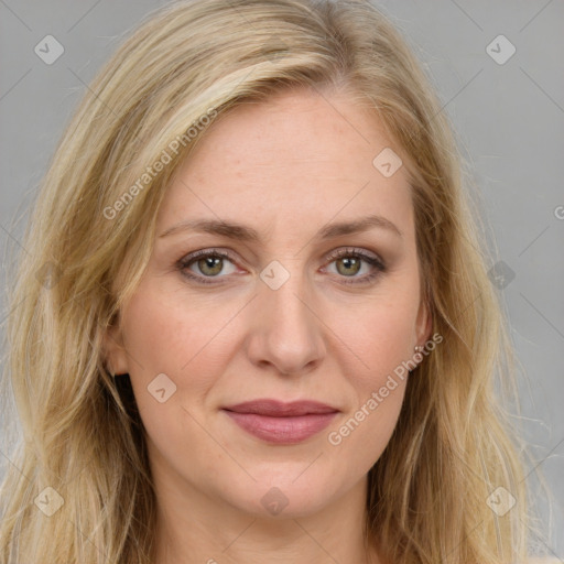 Joyful white young-adult female with long  brown hair and green eyes