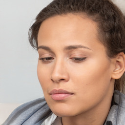 Neutral white young-adult female with short  brown hair and brown eyes