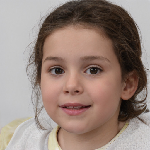 Joyful white child female with medium  brown hair and brown eyes