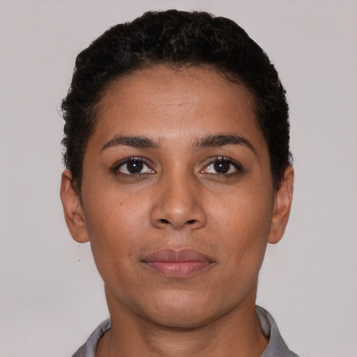 Neutral latino young-adult female with short  black hair and brown eyes