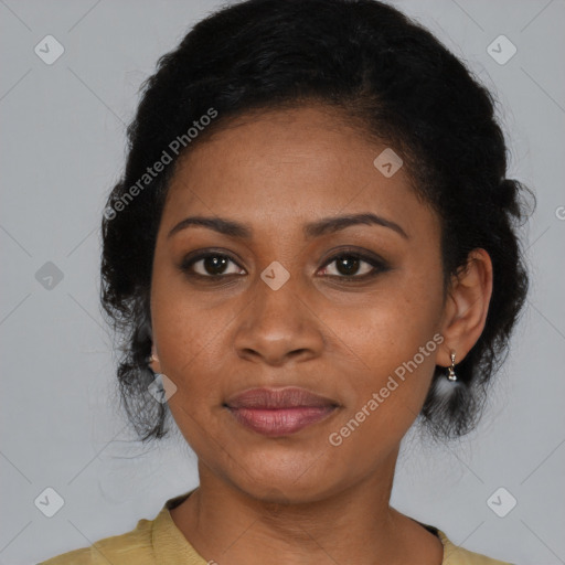 Joyful black young-adult female with medium  brown hair and brown eyes