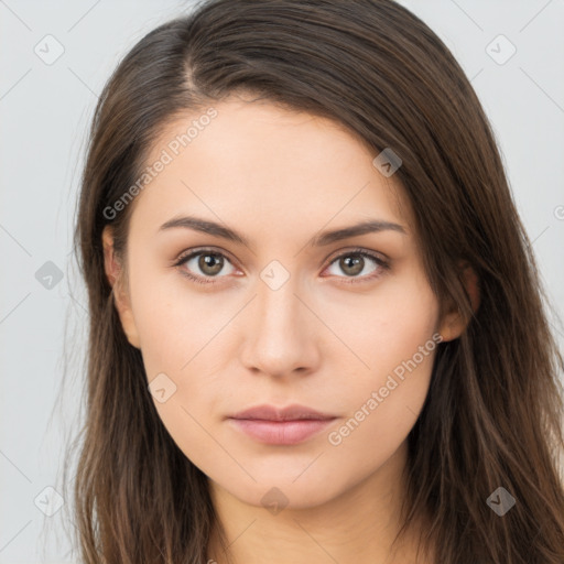 Neutral white young-adult female with long  brown hair and brown eyes