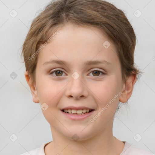 Joyful white child female with short  brown hair and brown eyes