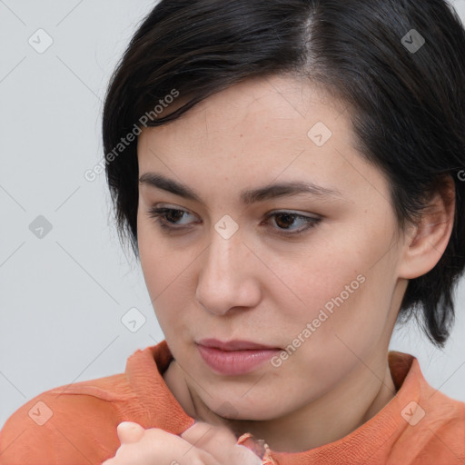 Neutral white young-adult female with medium  brown hair and brown eyes