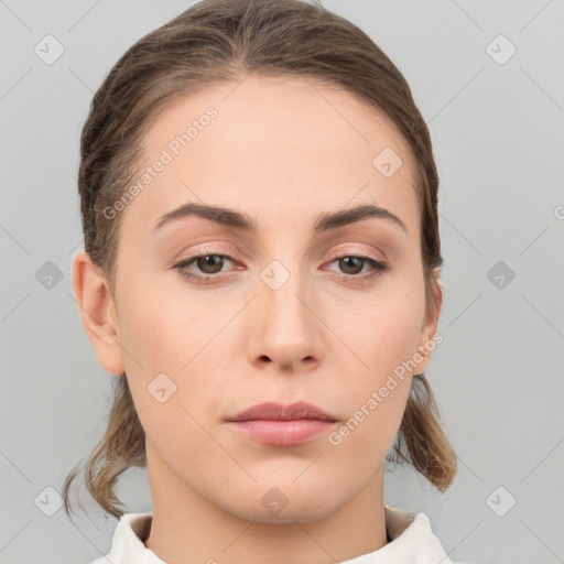 Neutral white young-adult female with medium  brown hair and brown eyes