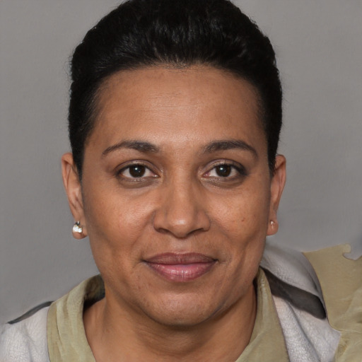 Joyful white adult female with short  brown hair and brown eyes