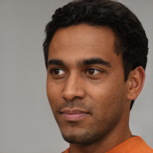 Neutral asian young-adult male with short  black hair and brown eyes