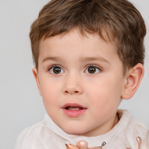 Neutral white child male with short  brown hair and brown eyes