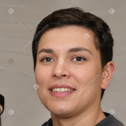 Joyful white young-adult female with short  brown hair and brown eyes