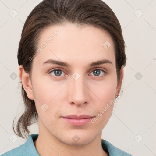 Neutral white young-adult female with medium  brown hair and grey eyes