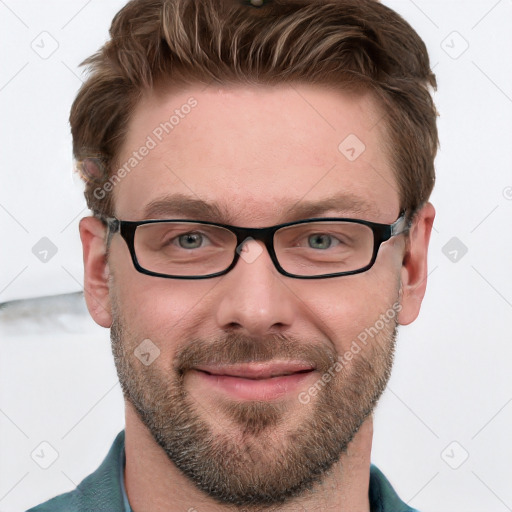 Joyful white adult male with short  brown hair and blue eyes