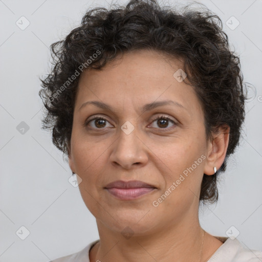 Joyful white adult female with short  brown hair and brown eyes