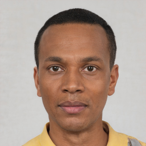 Neutral black young-adult male with short  black hair and brown eyes