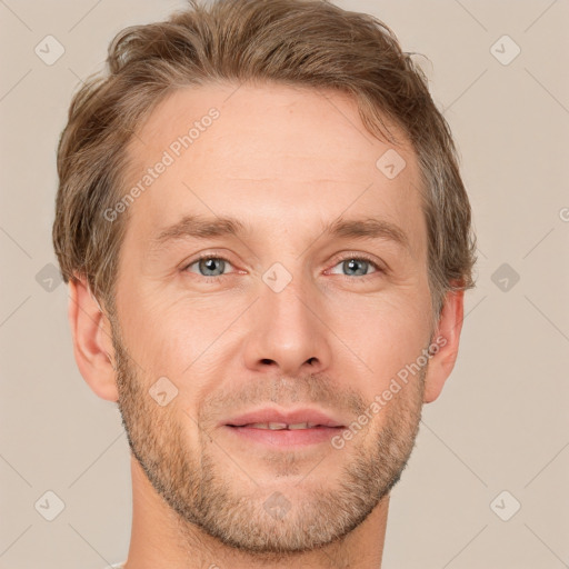 Joyful white adult male with short  brown hair and grey eyes