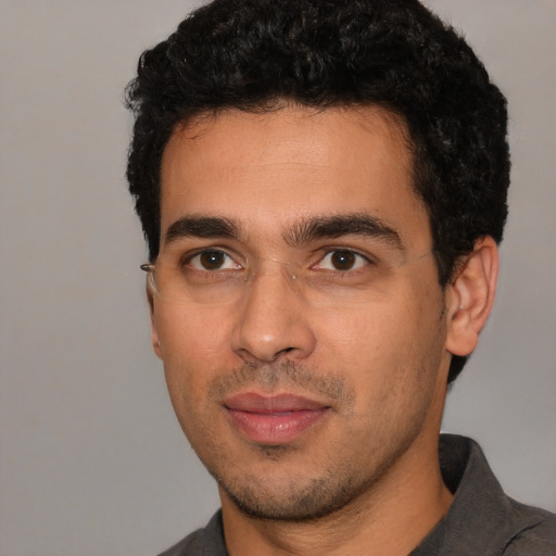 Neutral white young-adult male with short  black hair and brown eyes