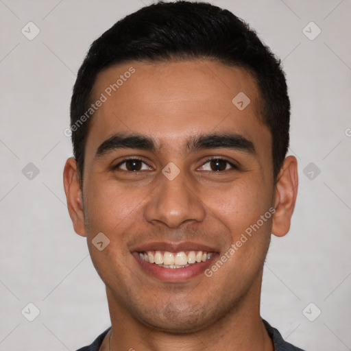 Joyful latino young-adult male with short  black hair and brown eyes