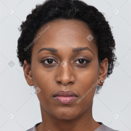 Neutral black young-adult female with short  black hair and brown eyes