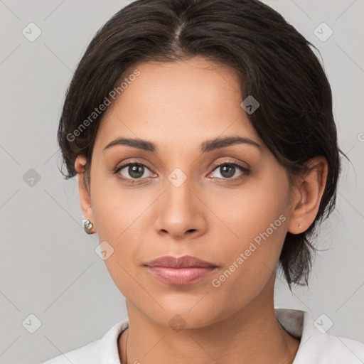 Neutral white young-adult female with medium  brown hair and brown eyes