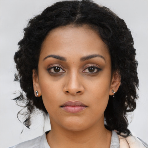 Neutral latino young-adult female with long  black hair and brown eyes