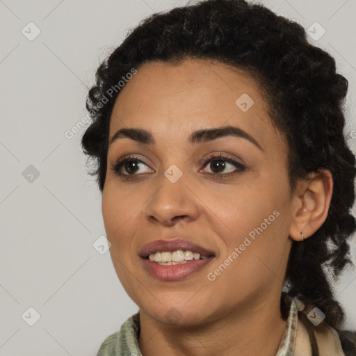 Joyful latino young-adult female with long  black hair and brown eyes