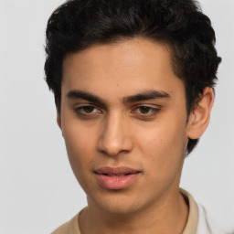 Neutral latino young-adult male with short  brown hair and brown eyes