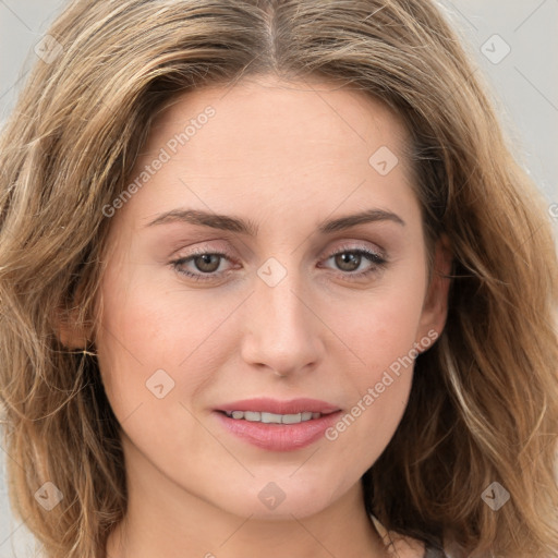 Joyful white young-adult female with long  brown hair and green eyes