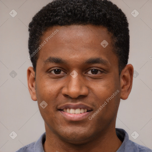 Joyful latino young-adult male with short  brown hair and brown eyes