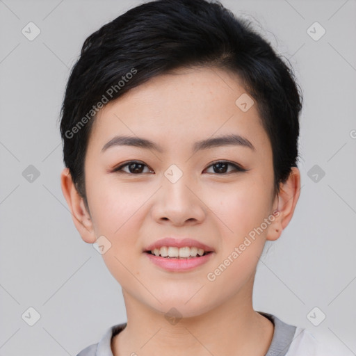 Joyful asian young-adult female with short  black hair and brown eyes