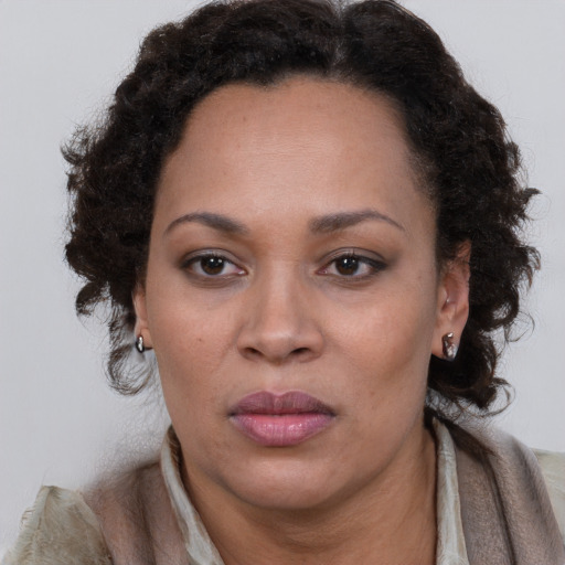 Neutral black adult female with short  brown hair and brown eyes