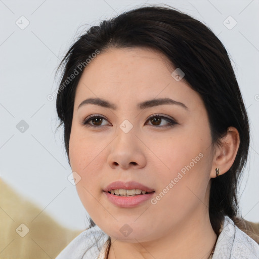 Joyful asian young-adult female with medium  black hair and brown eyes