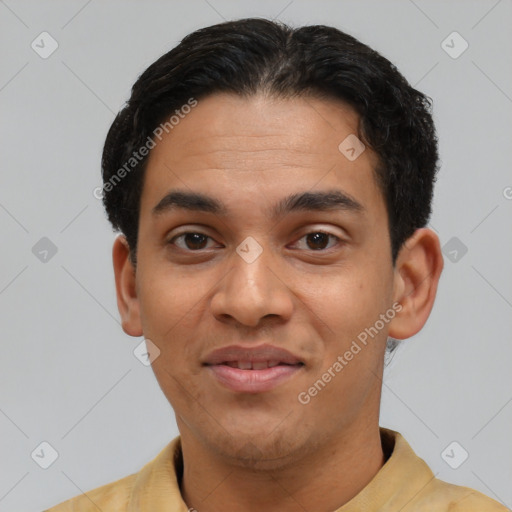 Joyful latino young-adult male with short  black hair and brown eyes